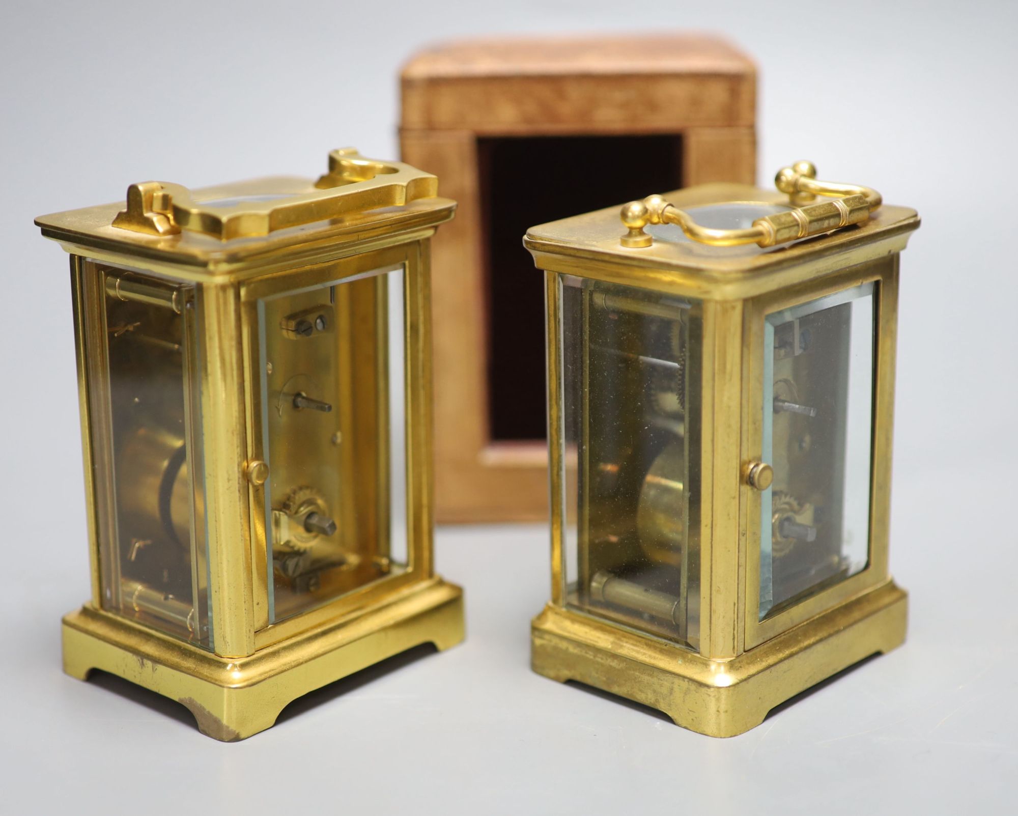 Two French gilt brass carriage timepieces, one cased